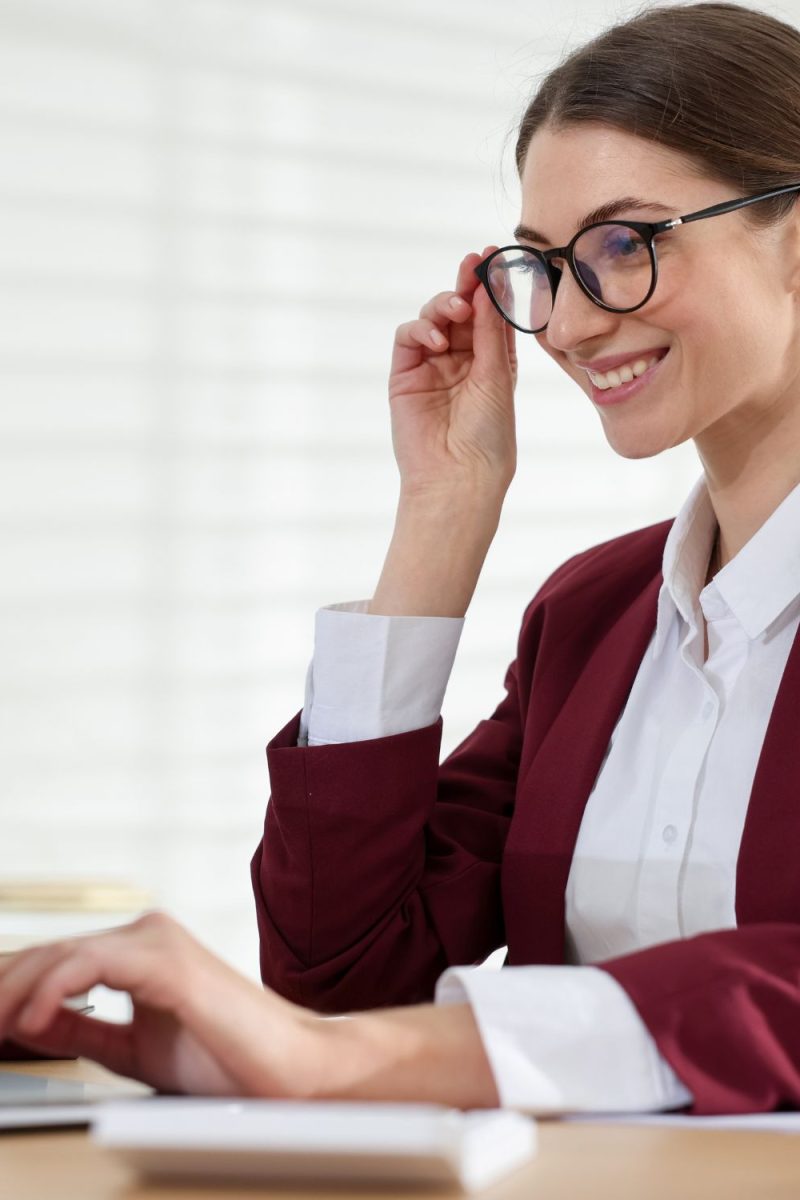 Professional reviewing Microsoft Copilot generated document suggestions within Microsoft 365